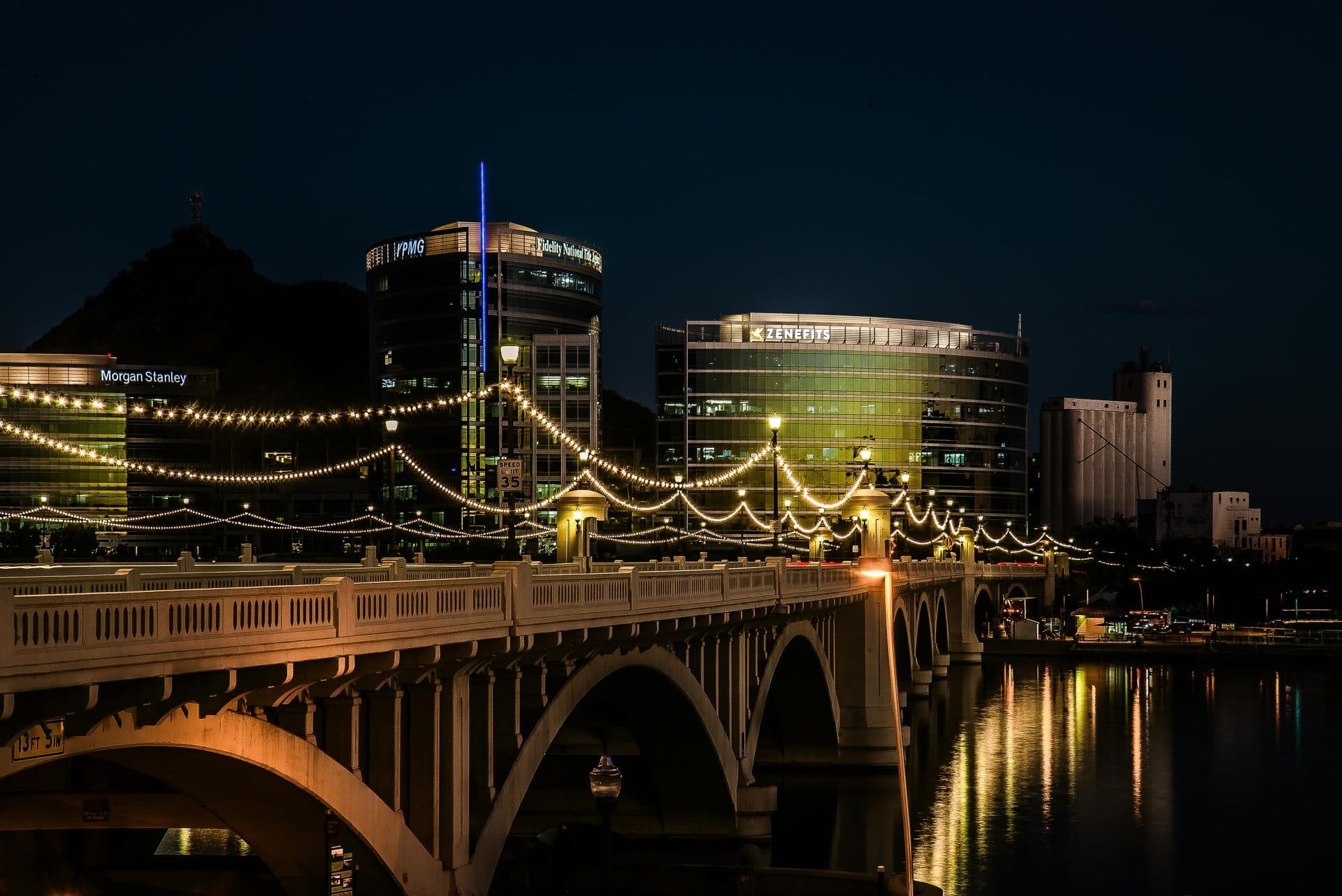 Tempe Town Lake bridge at night near DRR headquarters — Disaster Recovery Restoration serves Tempe and the Phoenix metropolitan area